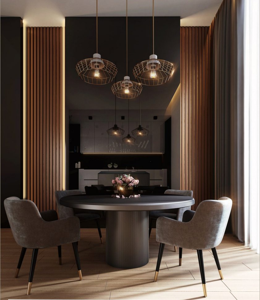 A round dark dining table under wire pendants, between slatted walnut walls