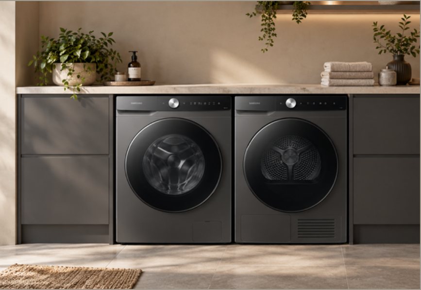 A Samsung washing machine and dryer side by side under a shelf
